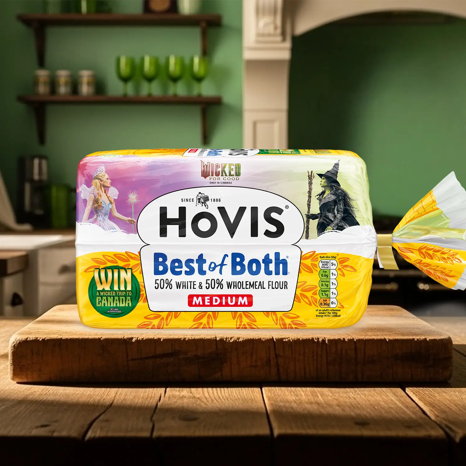 A Hovis best of both loaf sits on a table cloth on a wooden table