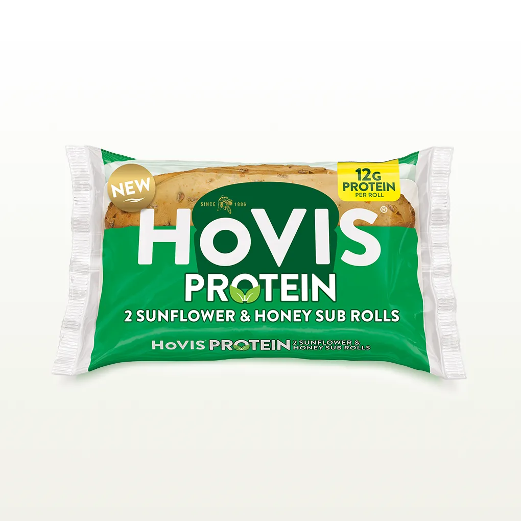 The pack shows two soft sub rolls with delicious sunflower seed on top “Deliciously soft and flavourful with a hint of honey.” The pack sits on a white backdrop with a subtle shadow.