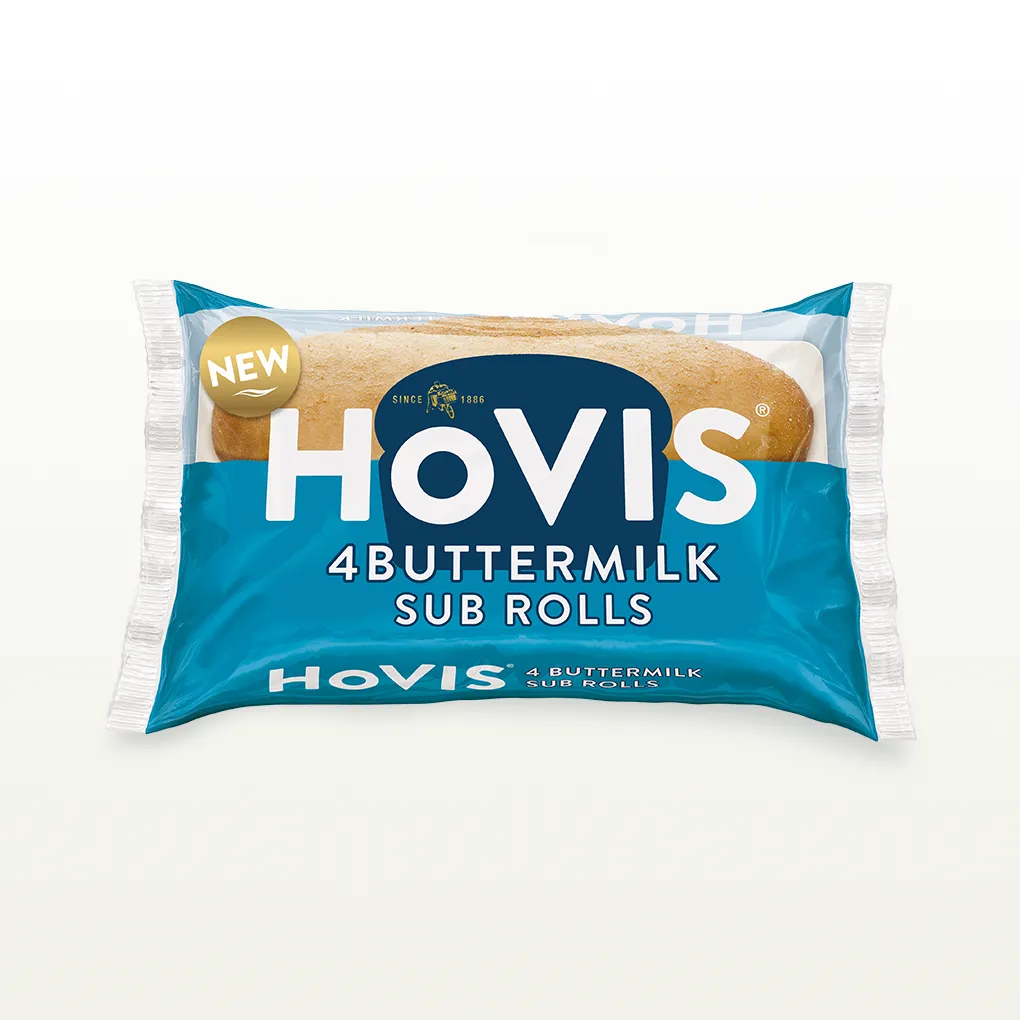 The pack shows two soft sub rolls and highlights “Deliciously soft and flavourful with a hint of buttermilk.” The pack sits on a white backdrop with a subtle shadow.