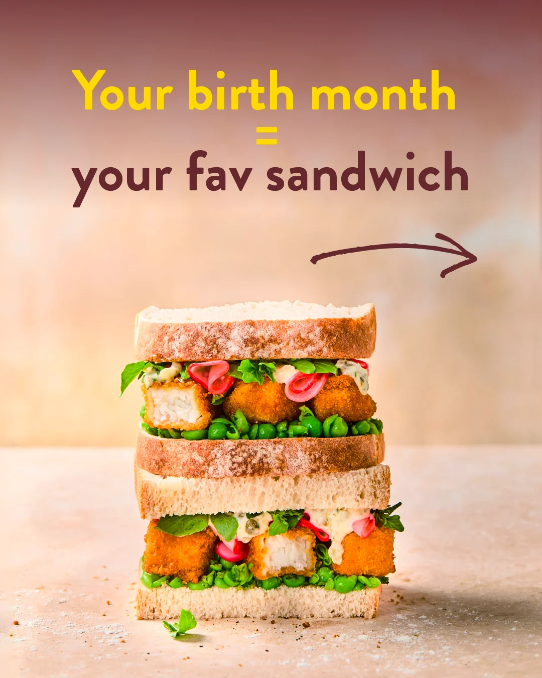 Your birth month = your fav sandwich. A fish finger sandwich sits on a cream coloured surface encouraging the user to swipe through.